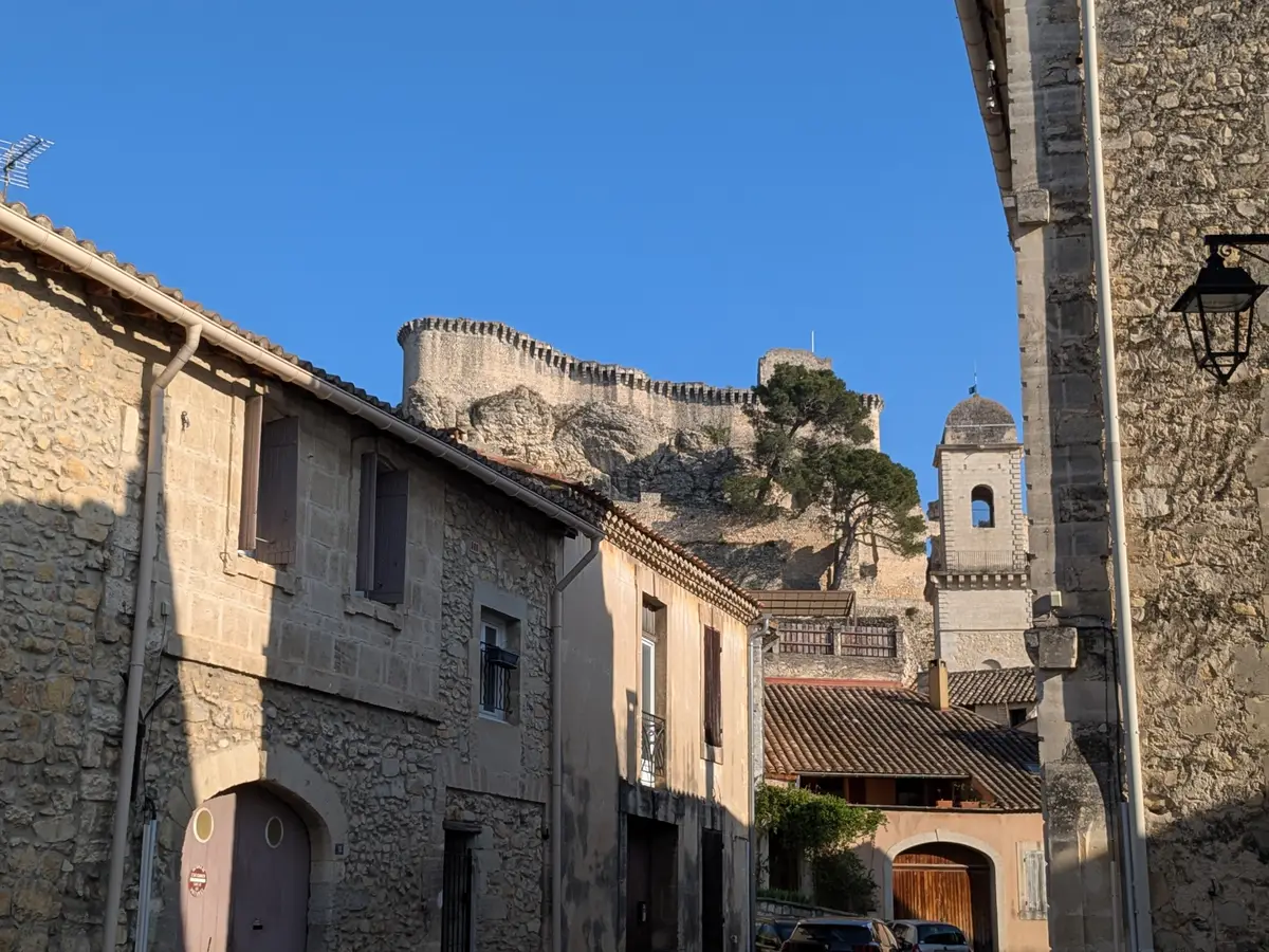 Old houses in Boulbon below the ruins of the castle and a bell tower