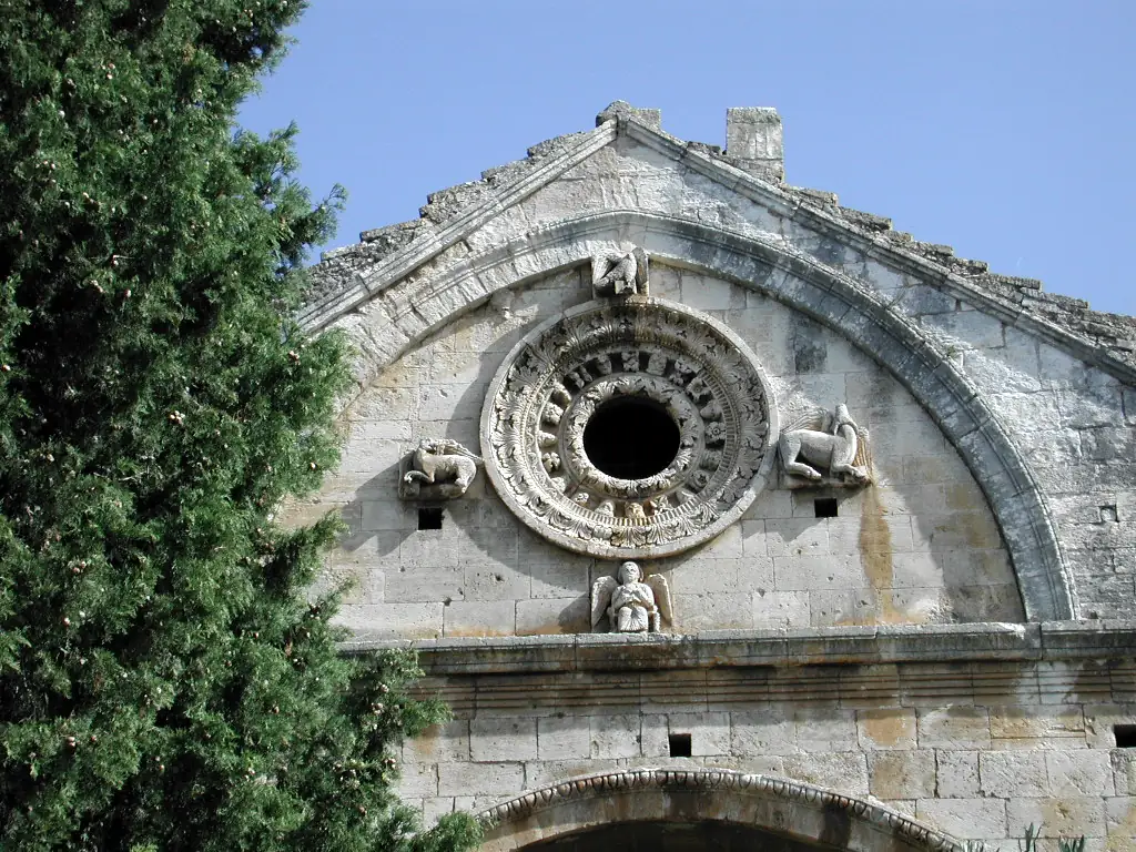 Oculus and sculptures on the gable of Saint Gabriel Chapel in Tarascon