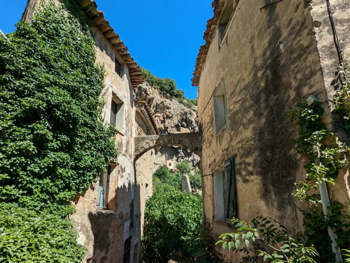 An old Cotignac lane beneath the cliff