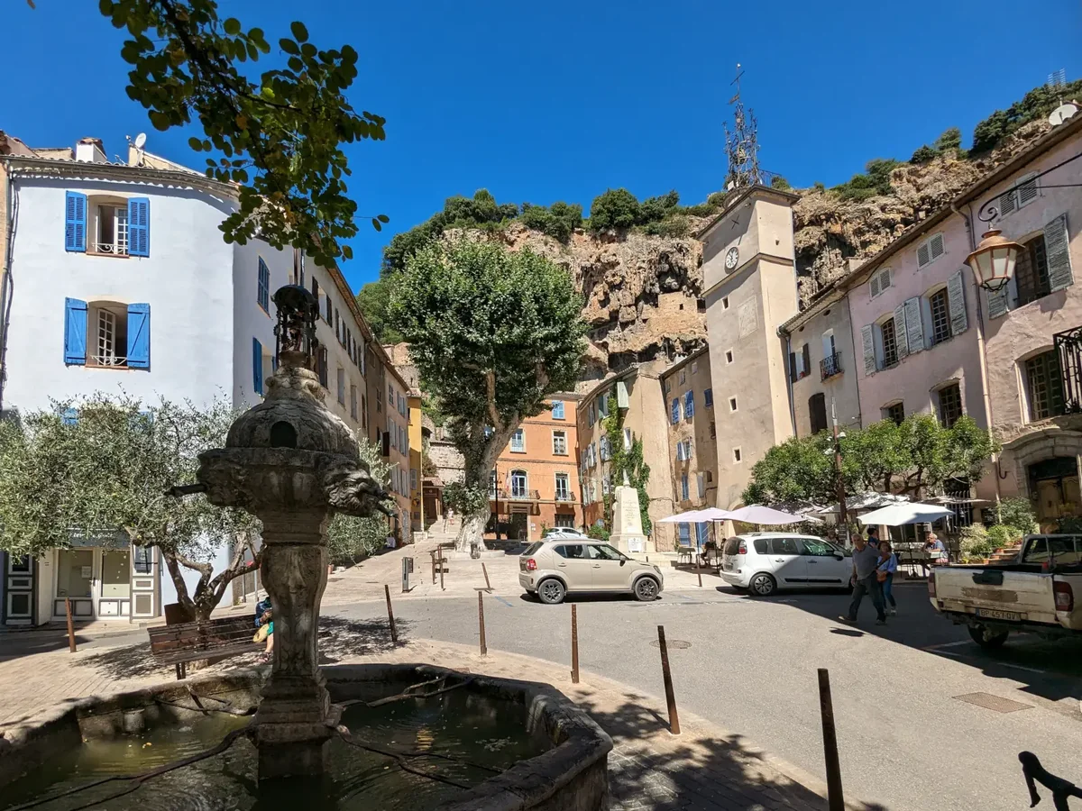 The town hall square and its fountain in Cotignac
