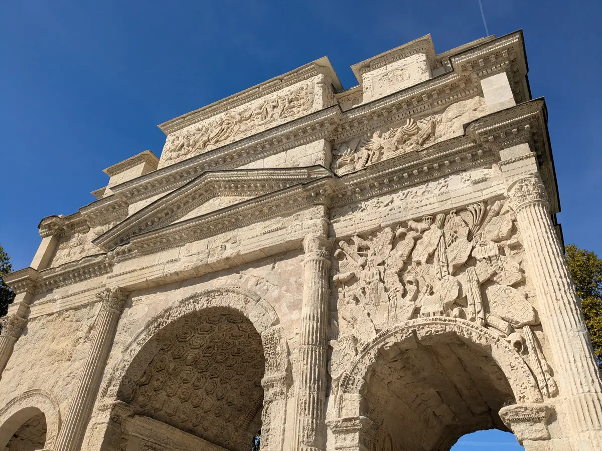 Reliefs above the vaulted passageways of the arch in Orange, seen from below