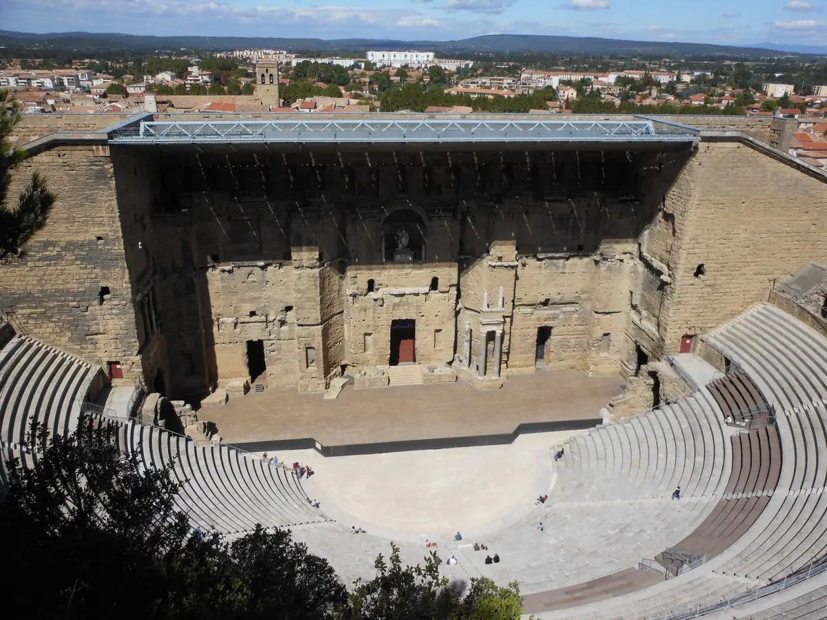 The semicircular seating, stage and great wall of the ancient theatre of Orange, seen from above
